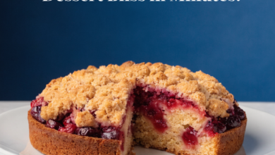 A golden, crumbly dump cake with fruit filling fresh out of the oven in a baking dish